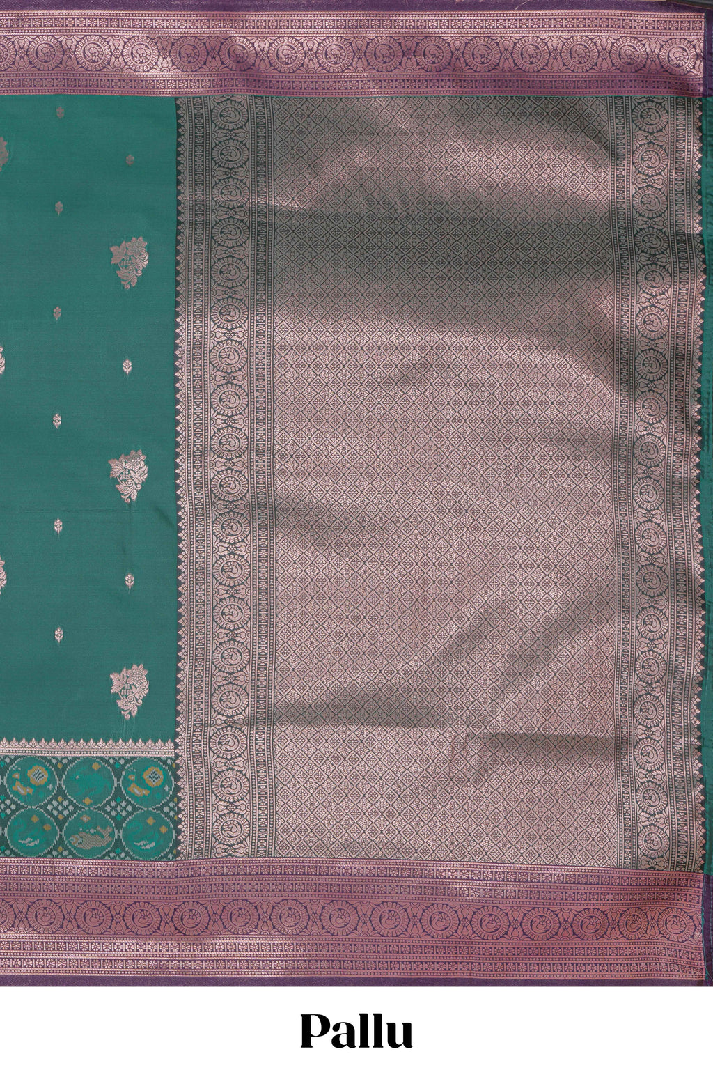 Green floral design zari motifs ikkat cotton saree with contrast zari design border and zari floral motifs blouse