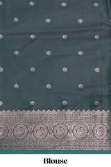 Green floral design zari motifs ikkat cotton saree with contrast zari design border and zari floral motifs blouse