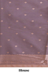 Pastel peach floral design zari motifs ikkat cotton saree with contrast zari design border and zari floral motifs blouse
