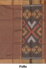Brown shade checked ikkat cotton saree with self zari border and matching blouse