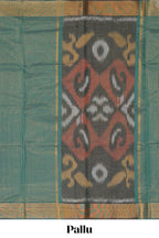 Green checked pure ikkat cotton saree with self zari border and matching blouse featuring beautifull ikkat design pallu