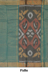 Green checked pure ikkat cotton saree with self zari border and matching blouse featuring beautifull ikkat design pallu