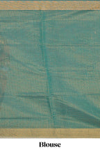 Green checked pure ikkat cotton saree with self zari border and matching blouse featuring beautifull ikkat design pallu