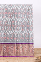 Grey ikkat design cotton saree with contrast zari border and violet Pallu and blouse