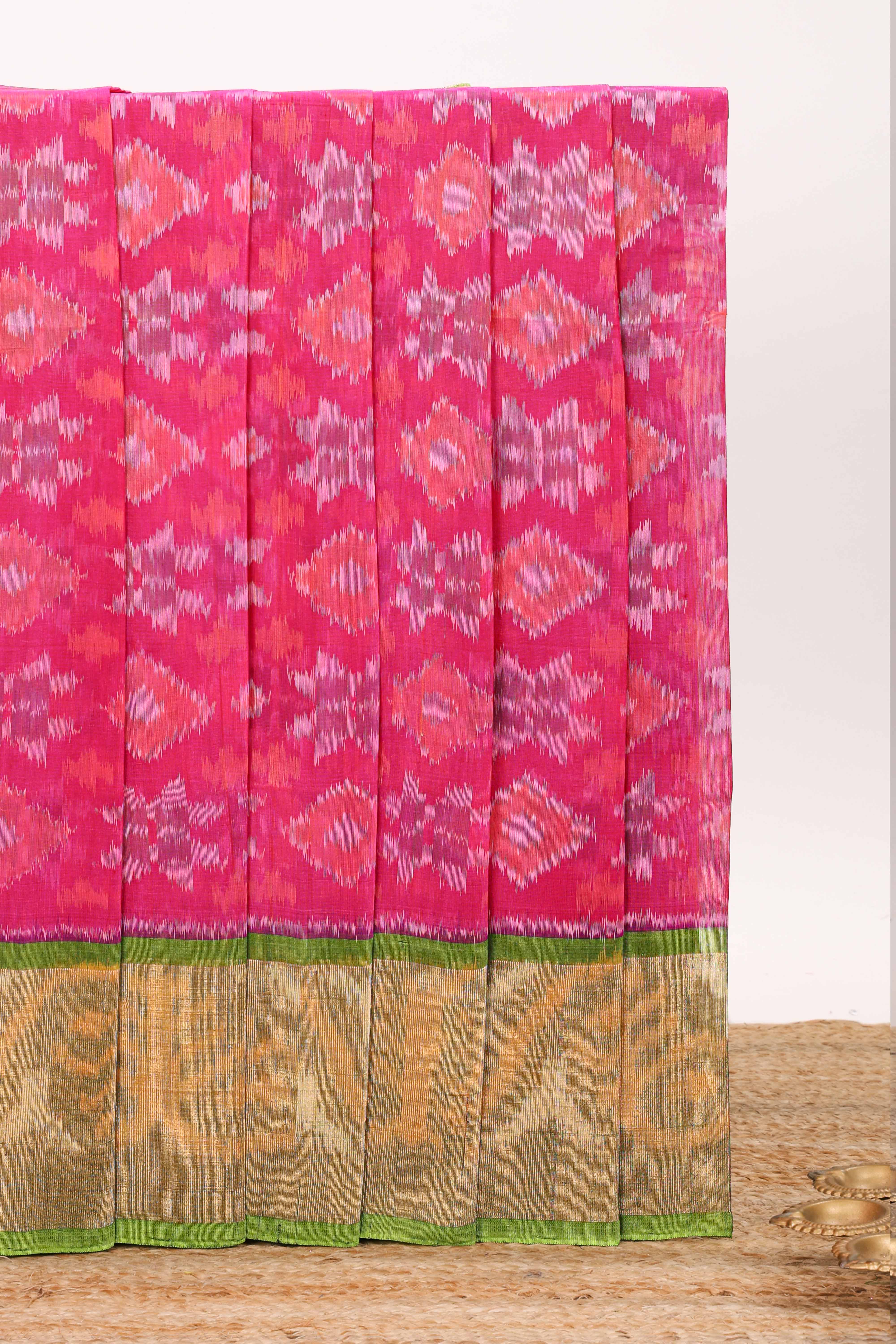 Pink geometric design ikkat cotton saree with contrast border and blouse
