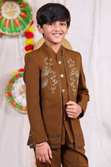 Brown boys suit set with gold piping and flower design