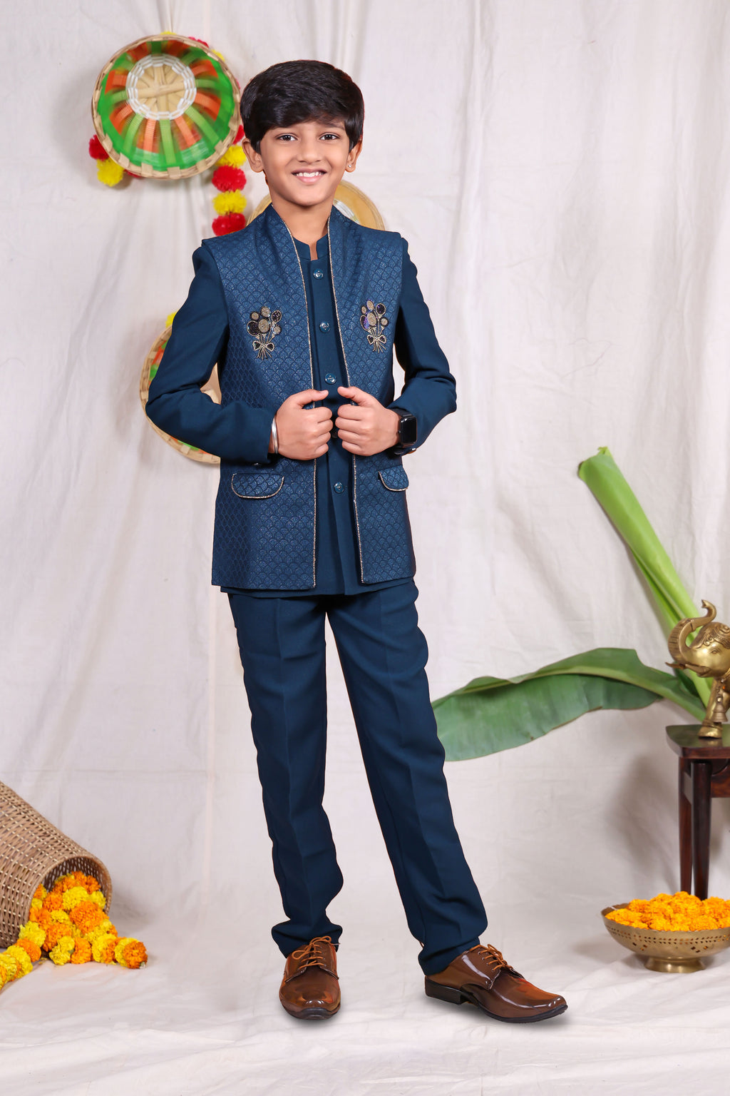Blue boys suit set with gold piping and flower design