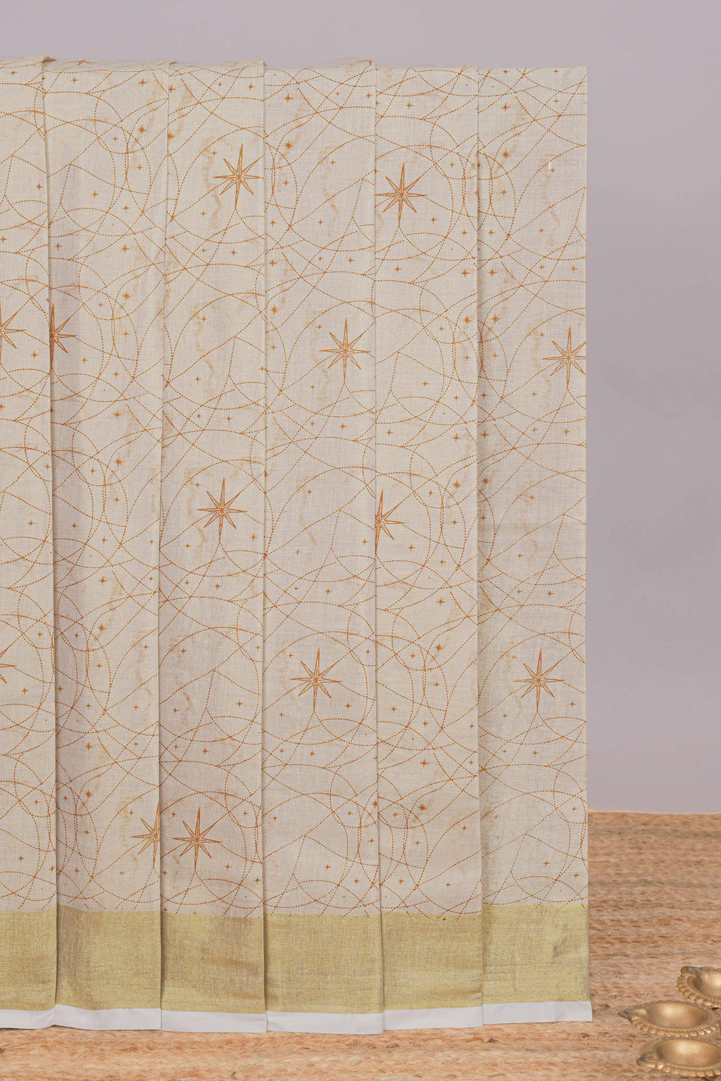 Cream unique design kerala cotton saree with self zari border and matching blouse