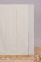 Cream plain design kerala cotton saree with self zari border and matching blouse