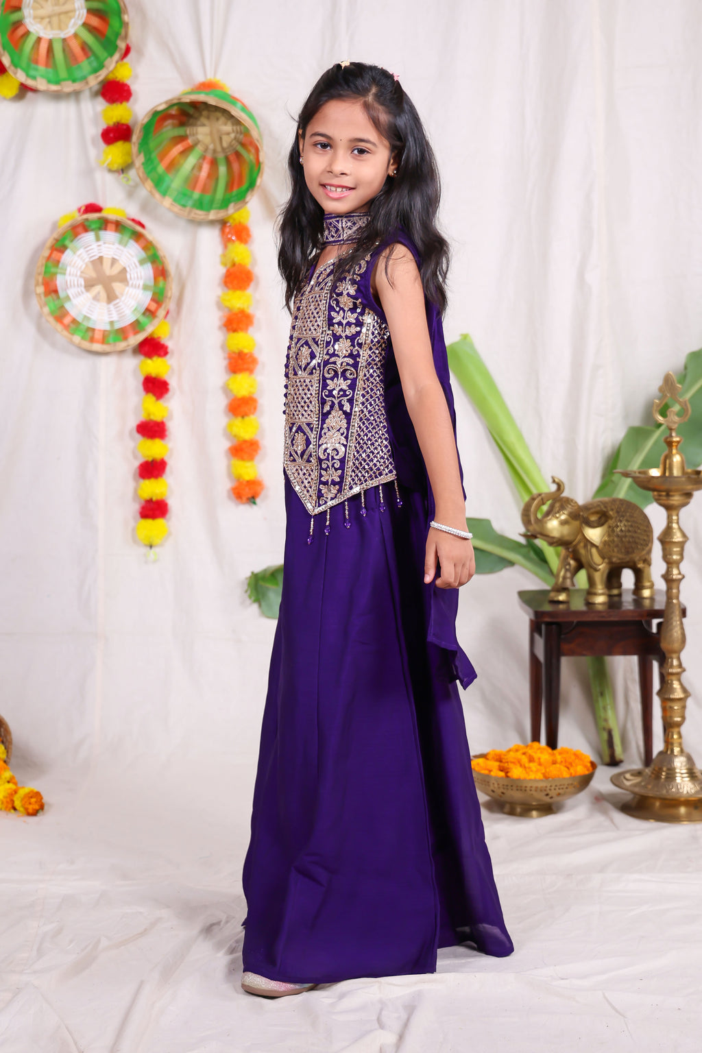 Girls Violet Indo Western Sharara Set with Heavily Embroidered Sleeveless Shrug Jacket and Chiffon Dupatta