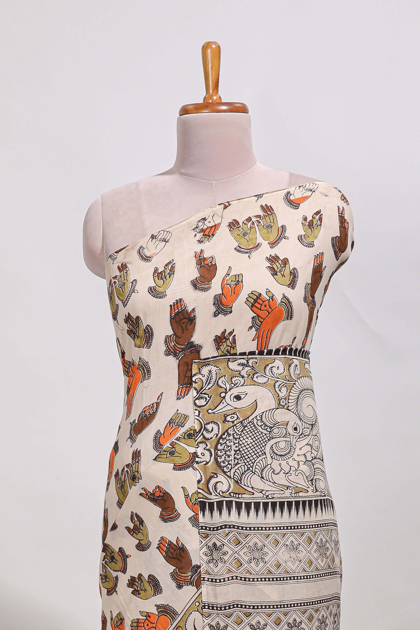 Multicolour kalamkari printed cotton saree with traditional floral motifs and contrast pallu