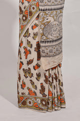 Multicolour kalamkari printed cotton saree with traditional floral motifs and contrast pallu