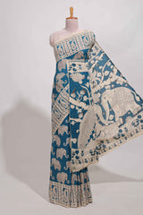 Blue kalamkari printed cotton saree with traditional floral motifs and contrast pallu