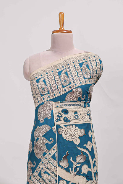 Blue kalamkari printed cotton saree with traditional floral motifs and contrast pallu