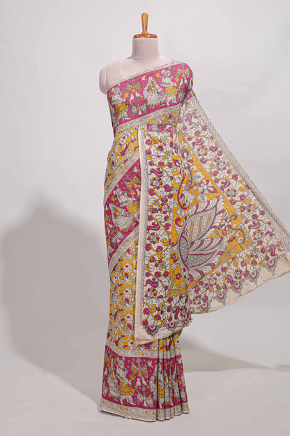 yellow kalamkari printed cotton saree with traditional floral motifs and contrast pallu