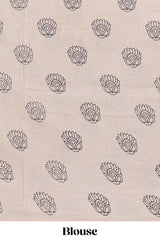 yellow kalamkari printed cotton saree with traditional floral motifs and contrast pallu