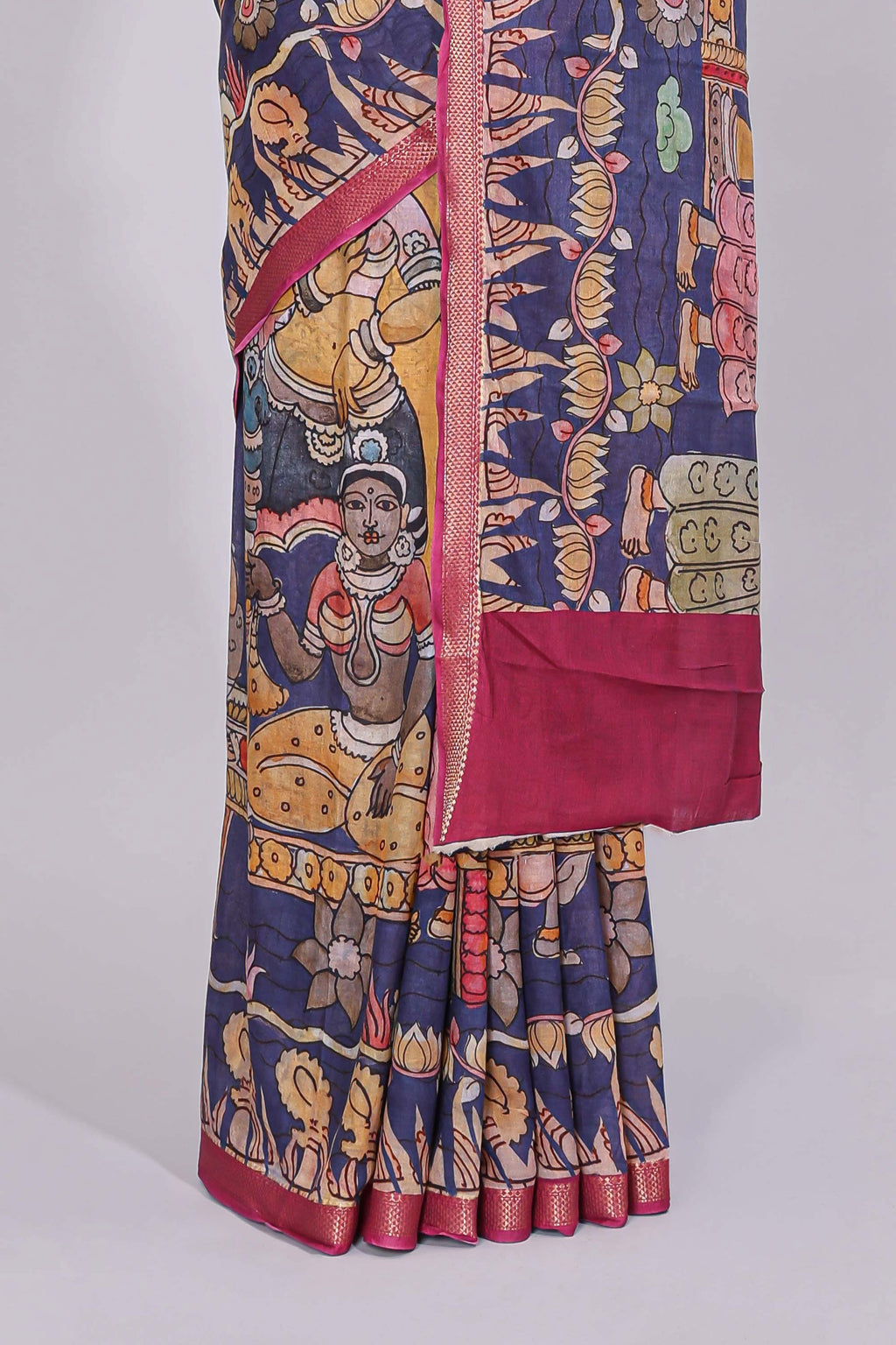 Blue traditional motifs kalamkari cotton saree with contrast zari border and floral motifs blouse