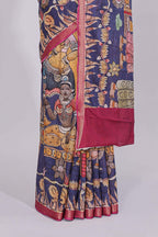 Blue traditional motifs kalamkari cotton saree with contrast zari border and floral motifs blouse