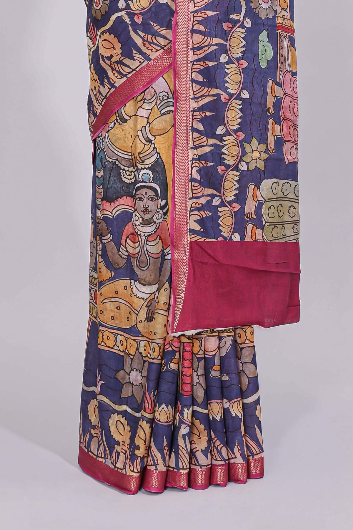 Blue traditional motifs kalamkari cotton saree with contrast zari border and floral motifs blouse