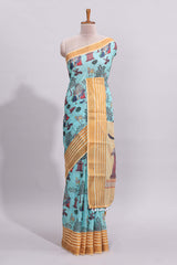 Blue traditional motifs kalamkari cotton saree with contrast zari border and motifs blouse