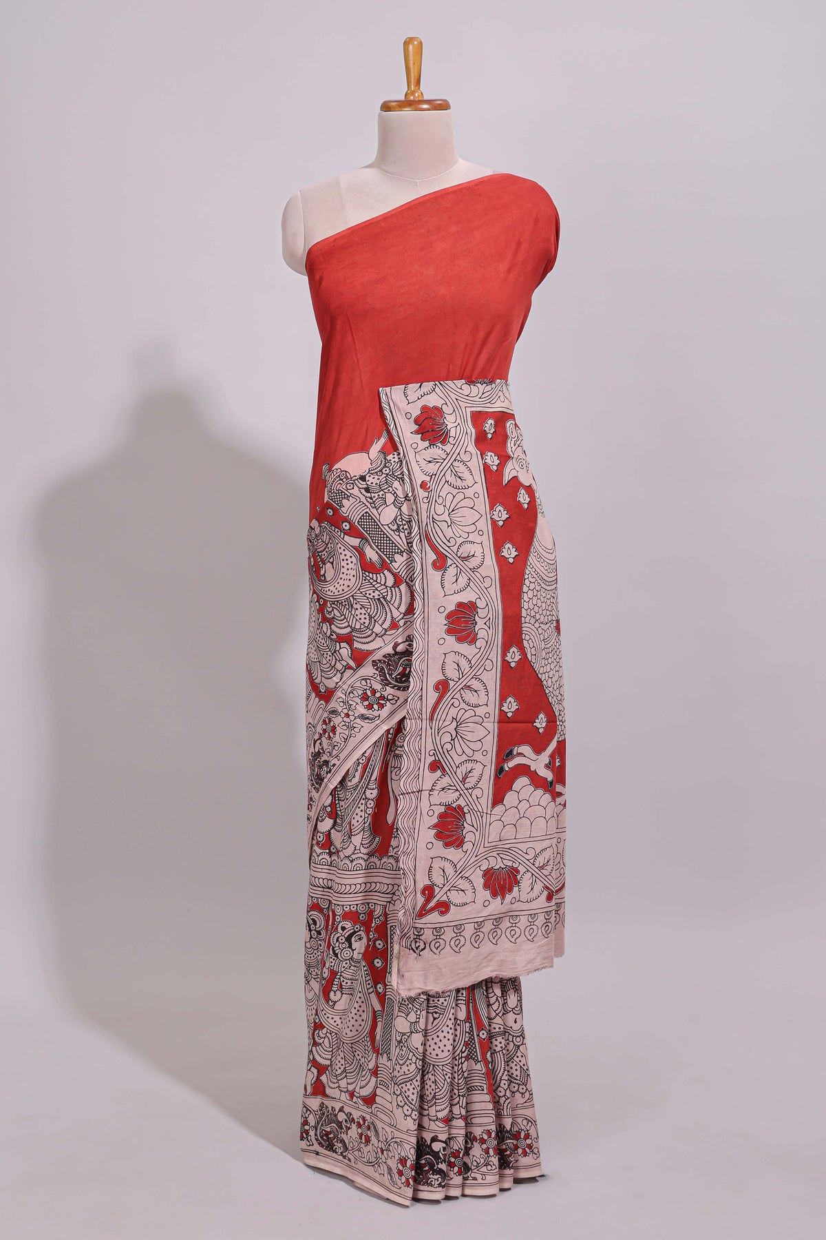 Red hand painted peacock & floral design kalamkari cotton saree with contrast border and floral printed blouse