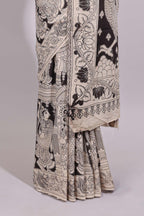 Black hand painted peacock & floral design kalamkari cotton saree with contrast border and floral printed blouse