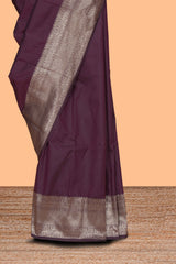 Deep purple plain kathan silk saree with self zari border and motifs blouse