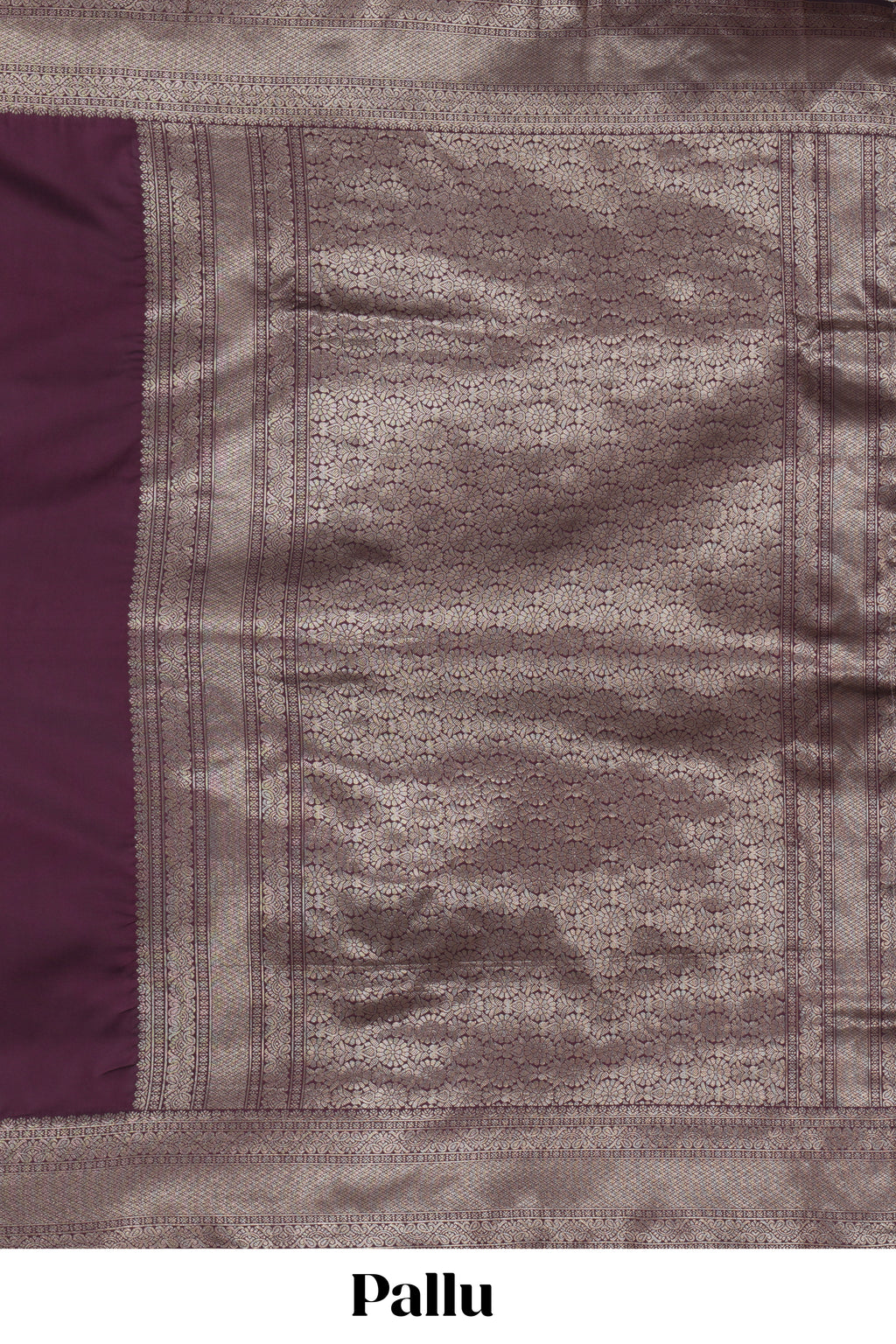 Deep purple plain kathan silk saree with self zari border and motifs blouse