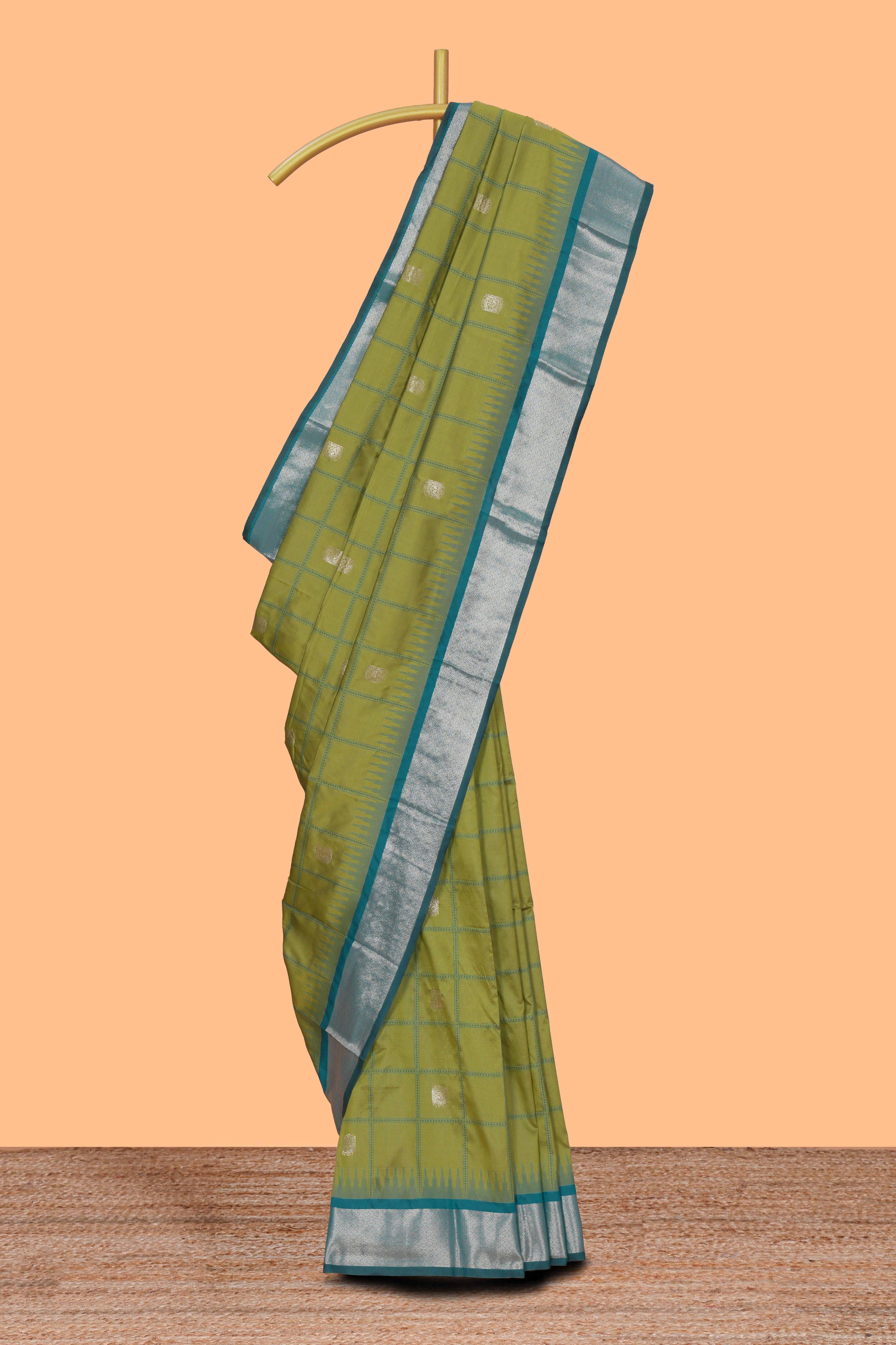 Green checked zari design kathan silk saree with contrast temple zari border and motifs blouse