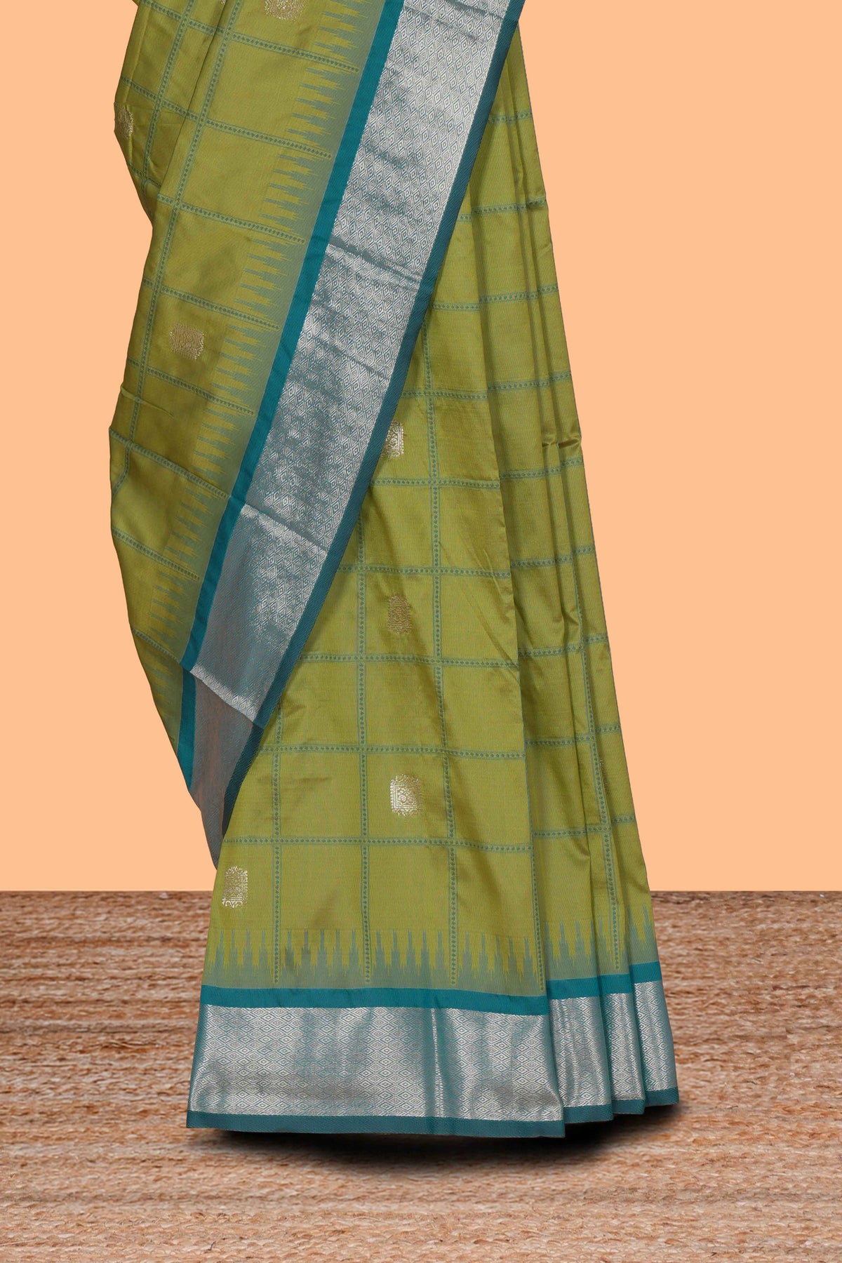 Green checked zari design kathan silk saree with contrast temple zari border and motifs blouse