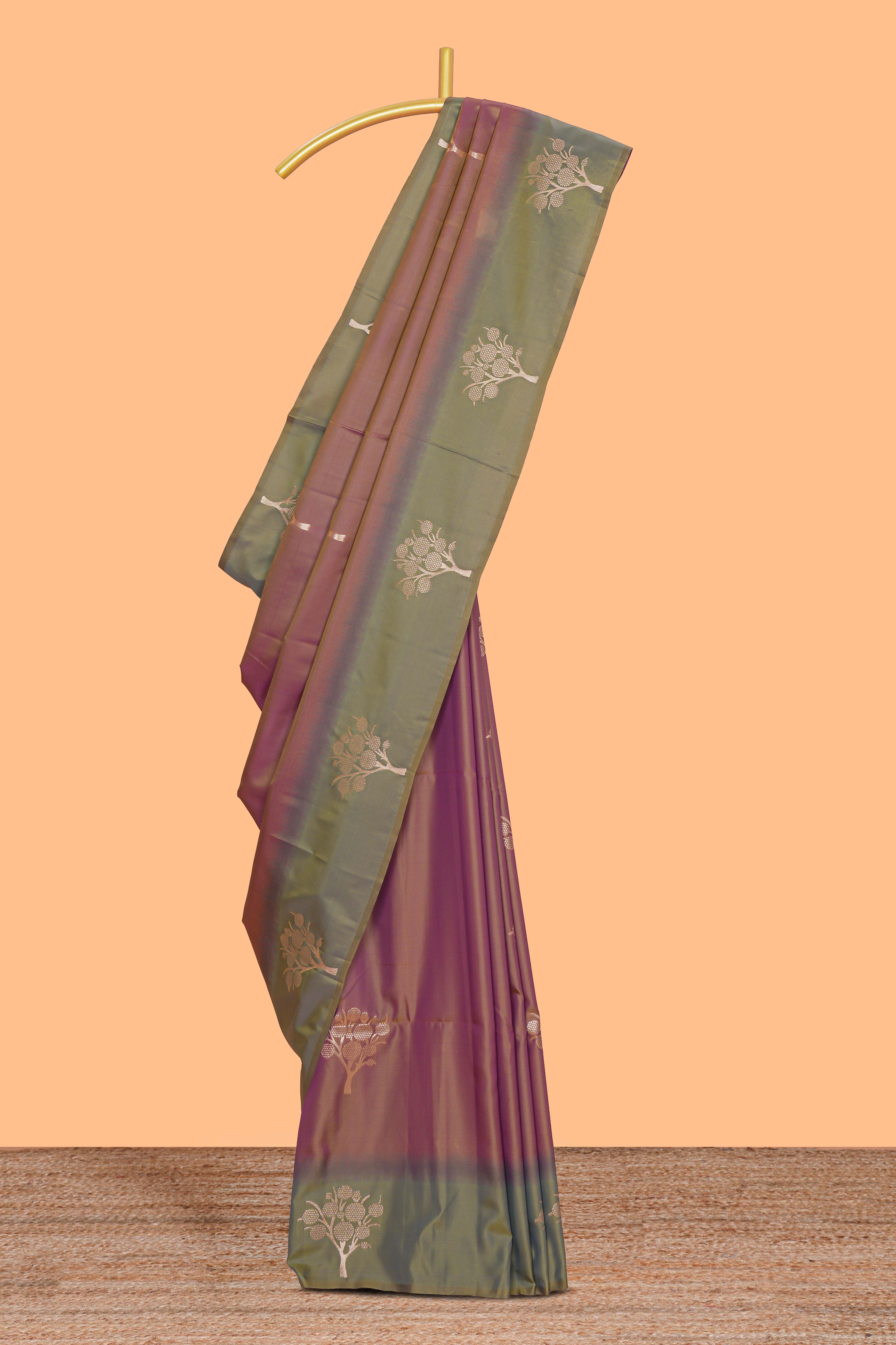 Deep ruby purple floral design kathan silk saree with contrast zari borders and motifs blouse