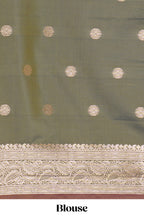 Deep ruby purple floral design kathan silk saree with contrast zari borders and motifs blouse
