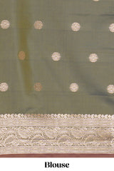Deep ruby purple floral design kathan silk saree with contrast zari borders and motifs blouse