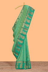 Green floral motifs zari design kathan silk saree with contrast zari borders and motifs blouse