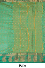 Green floral motifs zari design kathan silk saree with contrast zari borders and motifs blouse