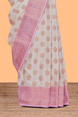 Cream zari motifs design kathan silk saree with contrast zari borders and blouse
