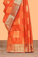 Orange geometric zari design kathan silk saree with self zari border and matching blouse