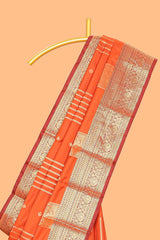 Orange geometric zari motifs design kathan silk saree with self zari border and matching blouse