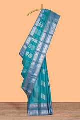 Teal blue geometric zari motifs design kathan silk saree with contrast border and matching blouse