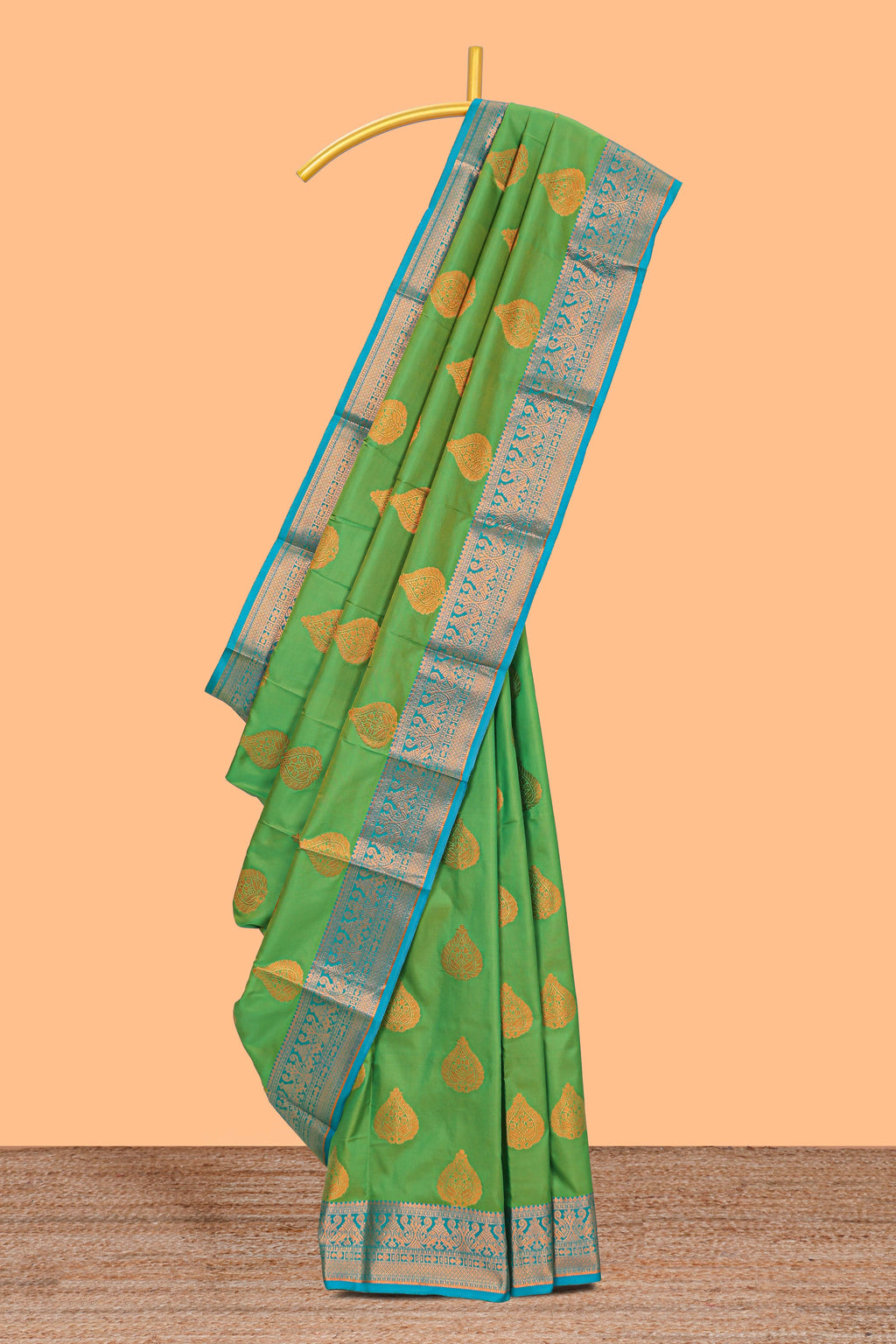 Green butta designed  kathan silk saree with contrast border and blouse