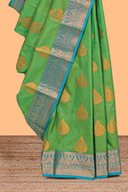Green butta designed  kathan silk saree with contrast border and blouse