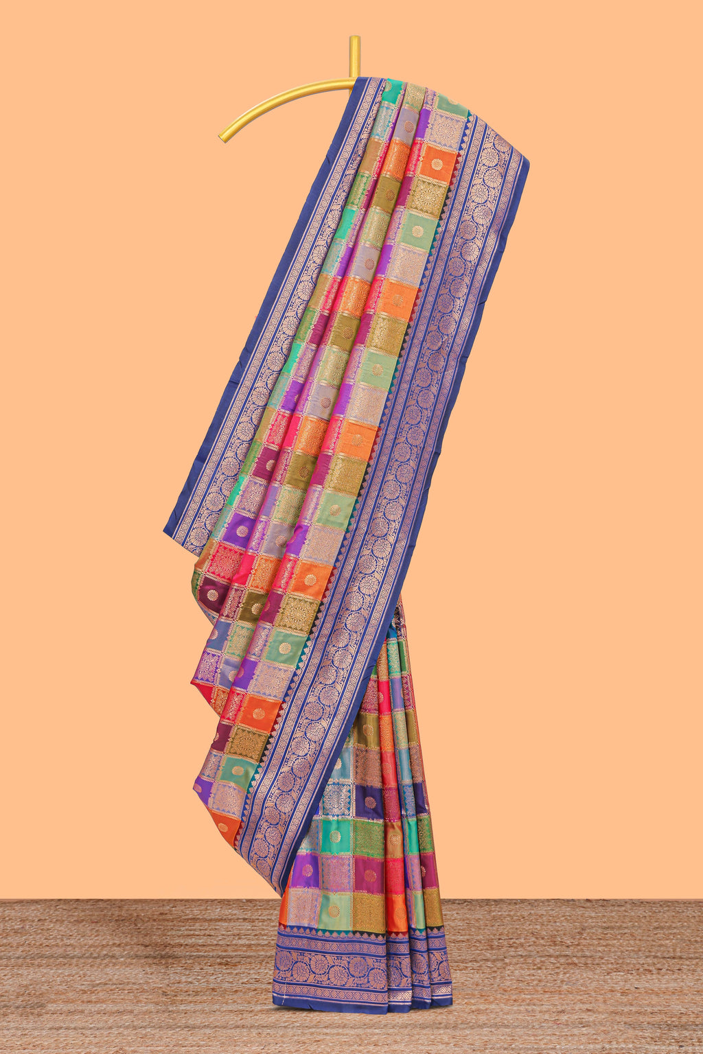 Multicolor checked floral motifs design kathan silk saree with contrast blue border and zari motis blouse