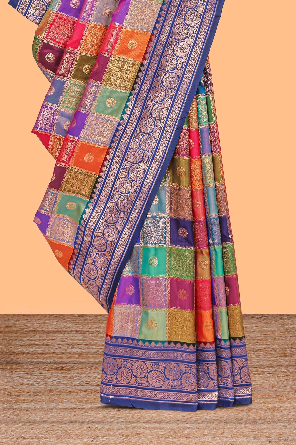 Multicolor checked floral motifs design kathan silk saree with contrast blue border and zari motis blouse