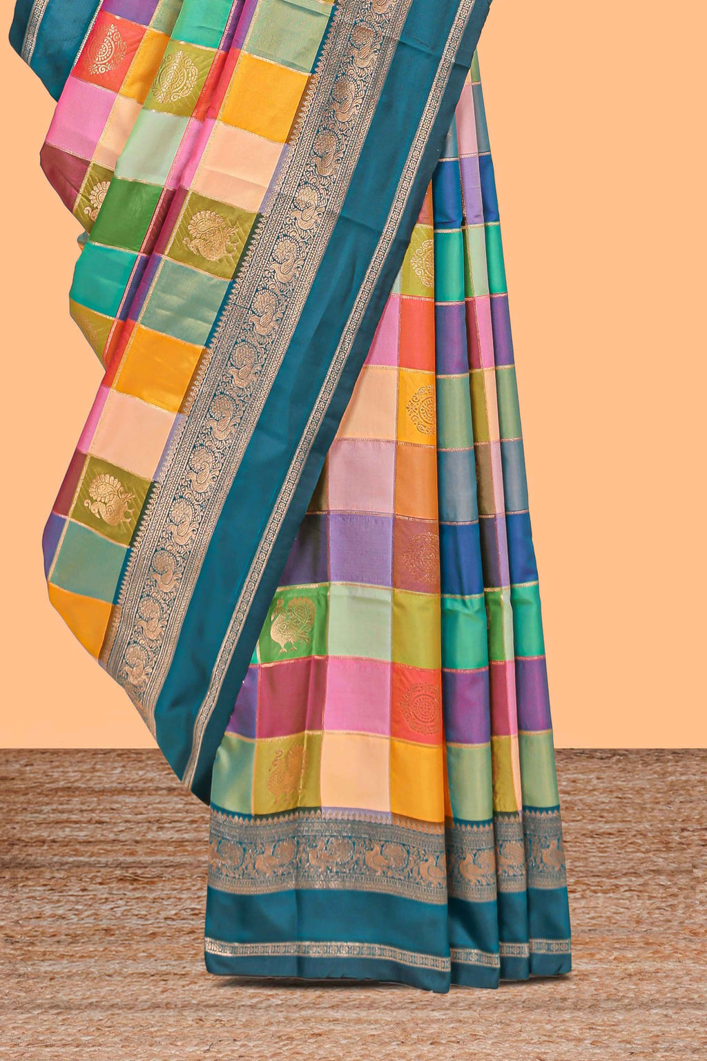 Multicolor checked floral motifs design kathan silk saree with contrast teal green border and zari motis blouse