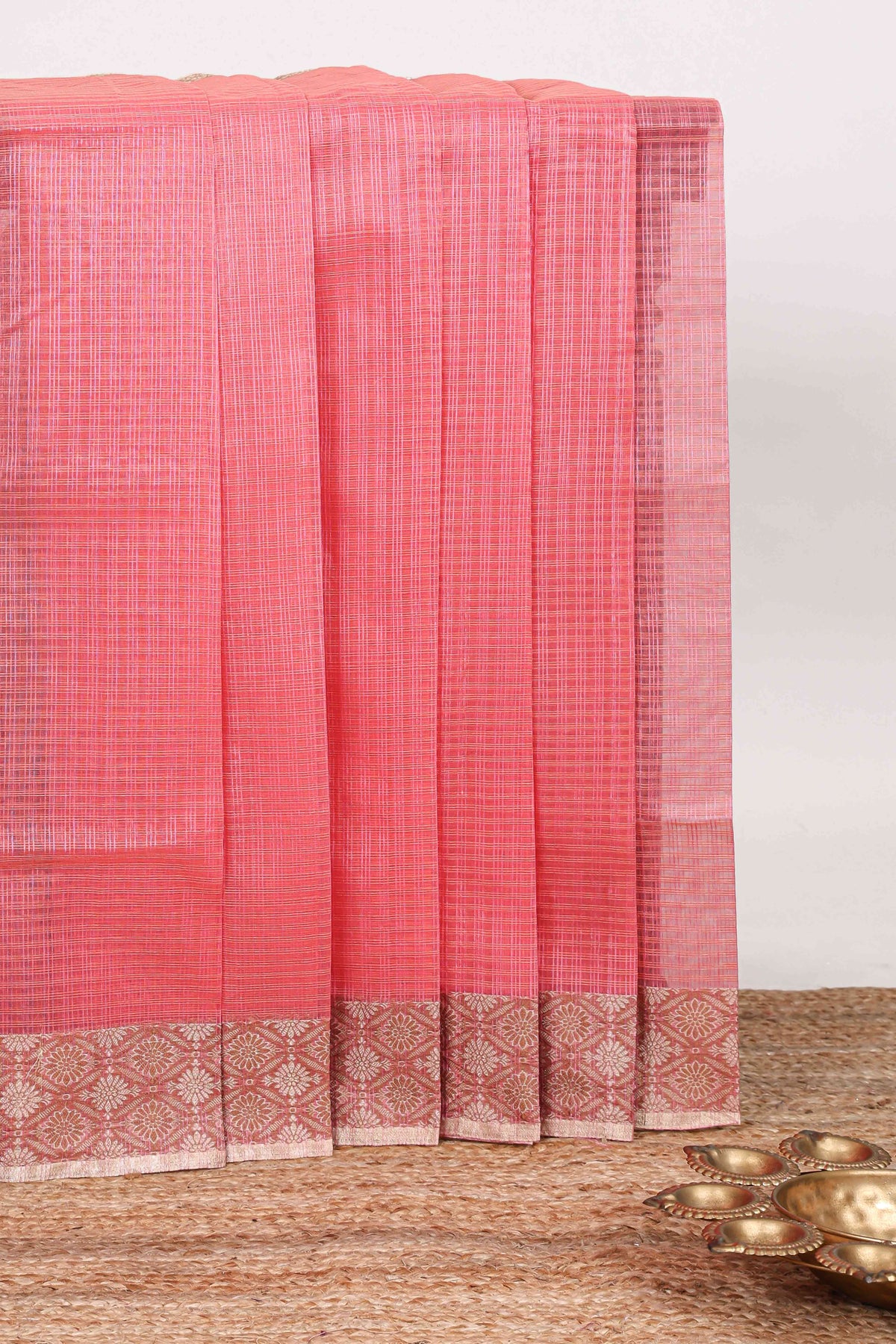 Pink checked kota cotton saree with contrast border and floral design blouse