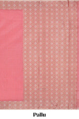 Pink checked kota cotton saree with contrast border and floral design blouse