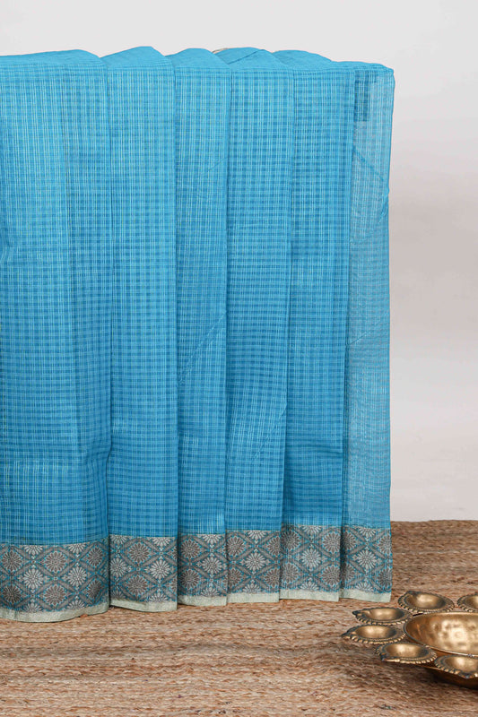 Blue checked kota cotton saree with contrast border and floral design blouse