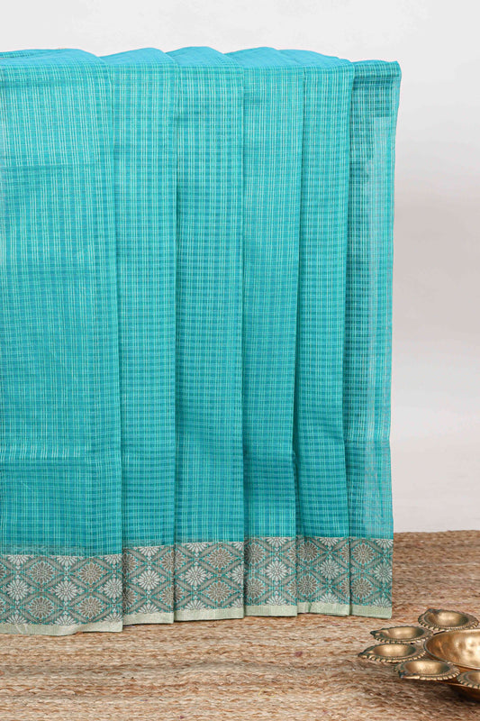 Turquoise blue checked kota cotton saree with contrast border and floral design blouse