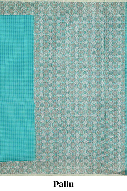 Turquoise blue checked kota cotton saree with contrast border and floral design blouse