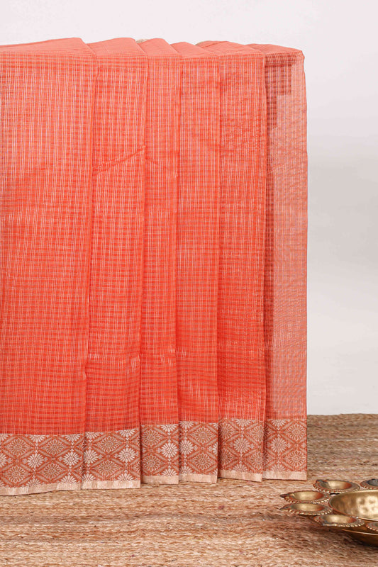 Orange checked kota cotton saree with contrast border and floral design blouse